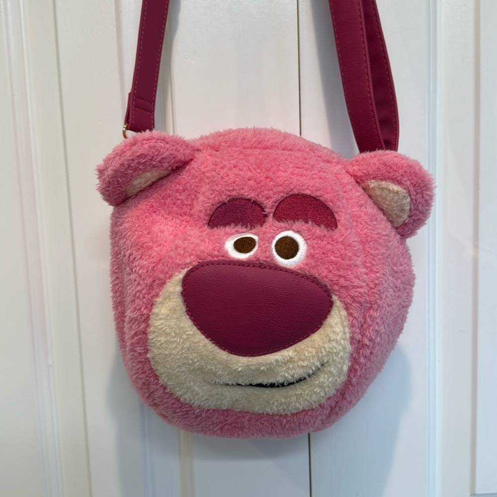 Loungefly Disney parks Toy Story lotso strawberry scented crossbody bag